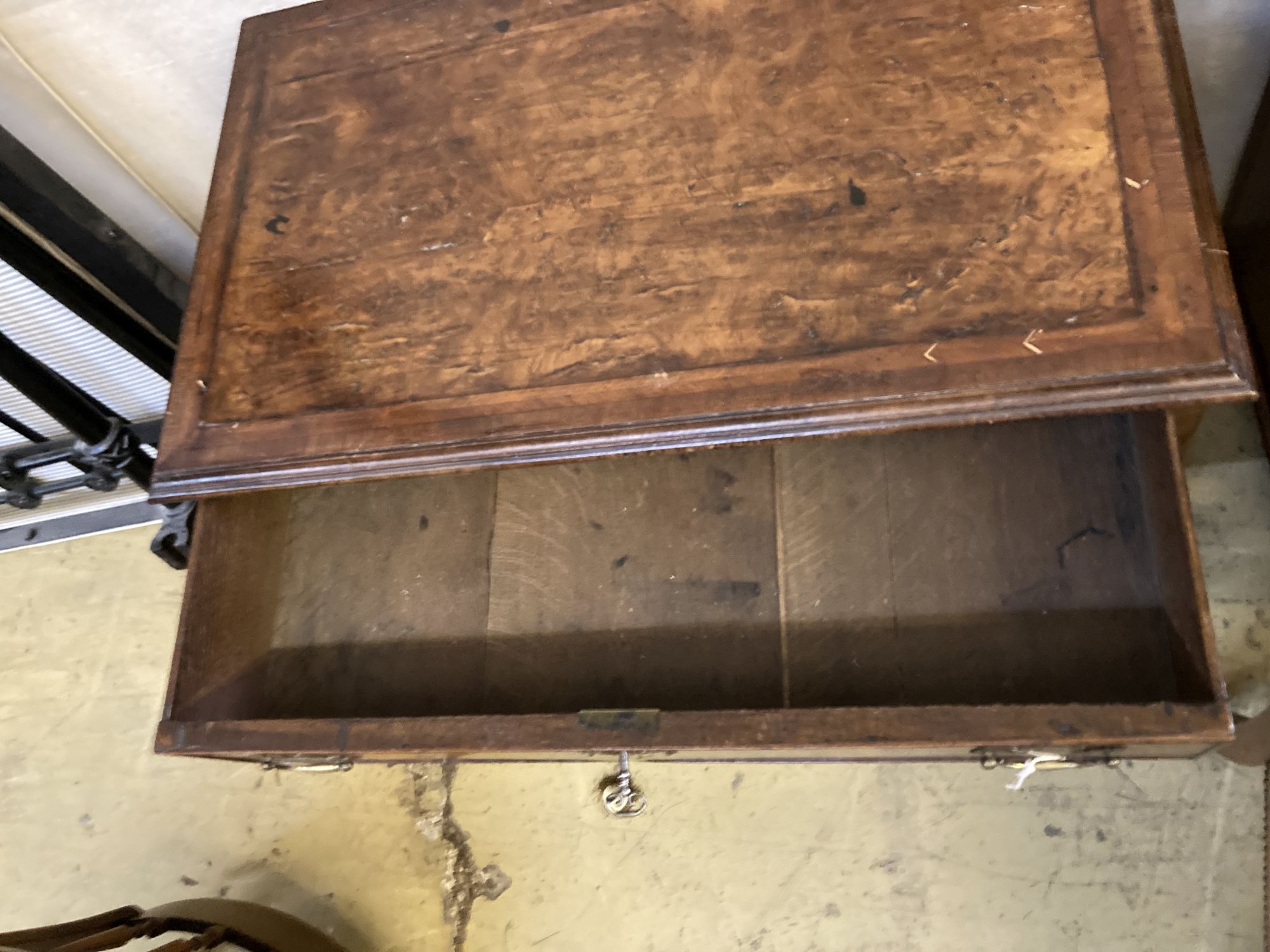 A George I style walnut kneehole desk, width 82cm, depth 49cm, height 78cm